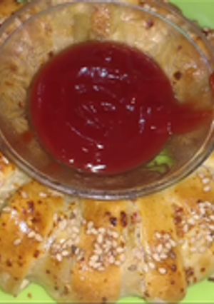 A picture of Chicken cheese bread.