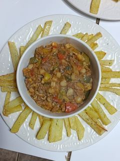 Una foto de Risotto de carne y verduras.