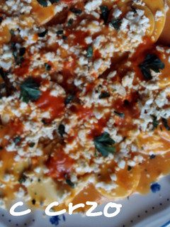 Una foto de Huevos cocidos en salsa