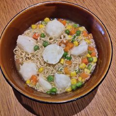 A picture of Instant Noodle with Cuttlefish Balls.