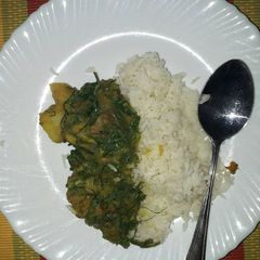 A picture of Mixed veggies stew with rice.