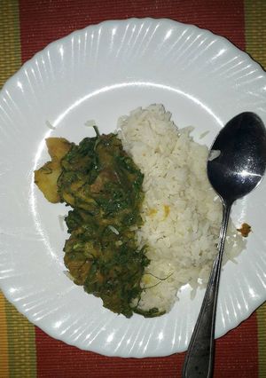 A picture of Mixed veggies stew with rice.