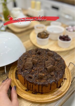 عکسی از دستور کیککدو با رویه شکلات وبیسکوییت