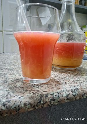 Une photo de Cocktail grenade et agrumes