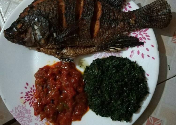 Fried Fish served with pumpkin leaves