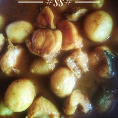 A picture of Bengali style Taki fish(Shole) curry with baby potatoes.