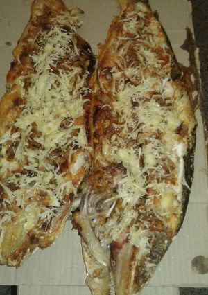 Una foto de Dorado y sábalo a la pizza