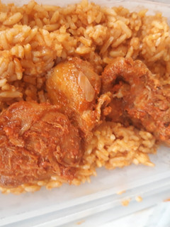 A picture of Jollof rice and beef.