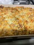 Gratin de langues d'oiseaux aux saucisses, champignons et emmental
