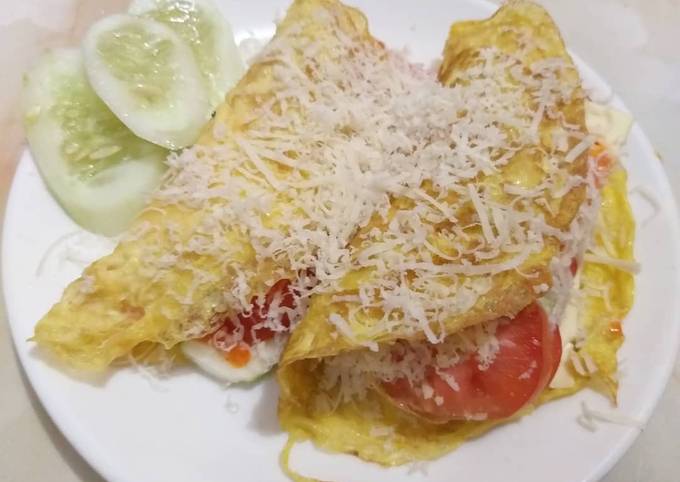 Resep Telur dadar isi keju tomat timun oleh Faris Helma s - Cookpad