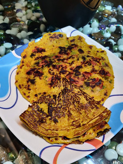 A picture of Tomato Pudlo / Tomato Cheela.