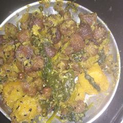 A picture of Malabar spinach lentil dumplings stir fry.