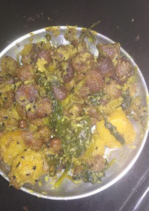 A picture of Malabar spinach lentil dumplings stir fry.