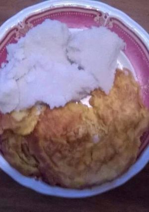 A picture of Fried eggs with ugali.