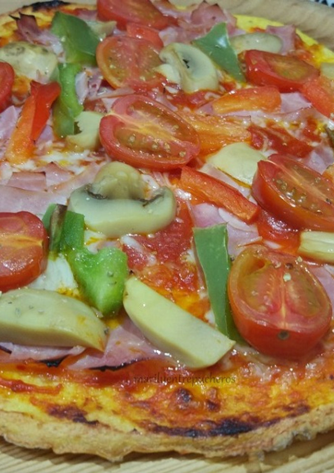 Una foto de Pizza con base de pollo