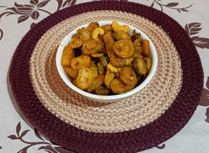A picture of Kaju-karela sabji (bitter gourd with cashews).