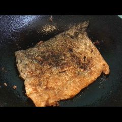 A picture of Crispy Nibble: Salmon Skin, “Do not throw away No 5”.