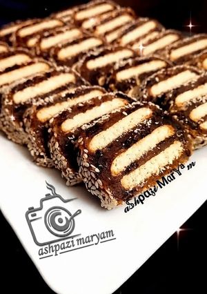 عکسی از دستور خرما رولی بیسکوییتی