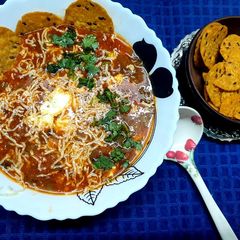 A picture of Mexican Vegetable Soup with Nachos.