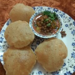 Poori aur chana aloo ki sabzi A picture of Poori aur chana aloo ki sabzi.