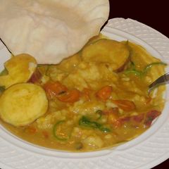A picture of Sweet potato sambar satham.