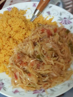A picture of Tumeric rice served with cabbage.