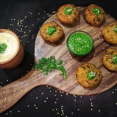 A picture of Aloo tikki with Mint Buttermilk.