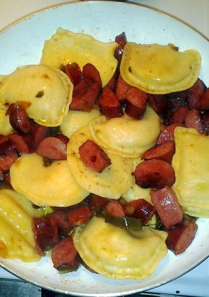 A picture of sausage and pierogies.