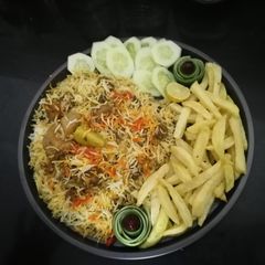 A picture of Smoked Biryani 😋🐓🍚.