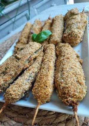 Une photo de Apéro de courgettes au parmesan