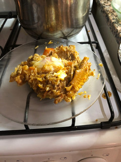 Una foto de Guiso de arroz con pollo a caballo