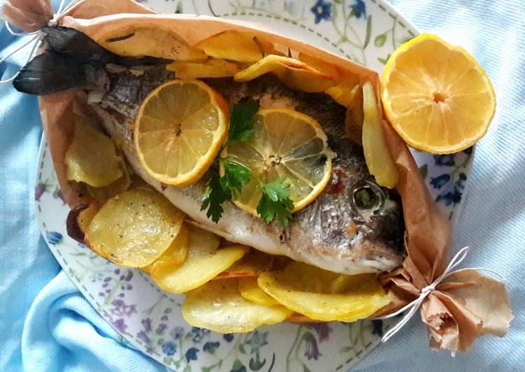 Orata al cartoccio con sfoglie di patate