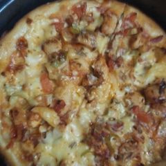 A picture of Pizza 😋.