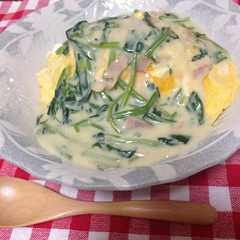 A picture of Omurice with Spinach Cream Sauce.