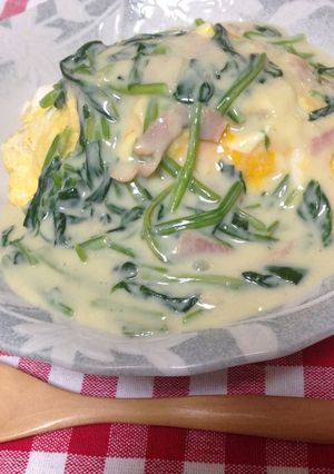 A picture of Omurice with Spinach Cream Sauce.