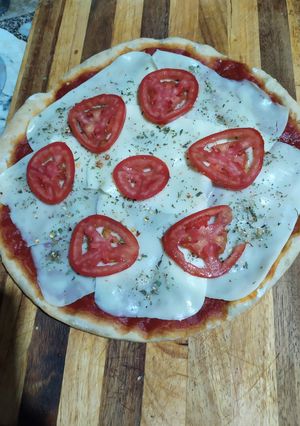 Una foto de Pizza