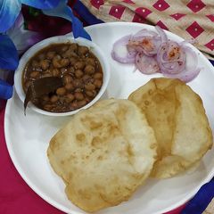 A picture of Cholle Oats Paneer Bhature.