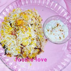 A picture of Kesar badami paneer butter biriyani.