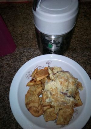 A picture of Potatoes and fried eggs.