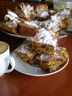 A picture of Cake with nuts and prunes.