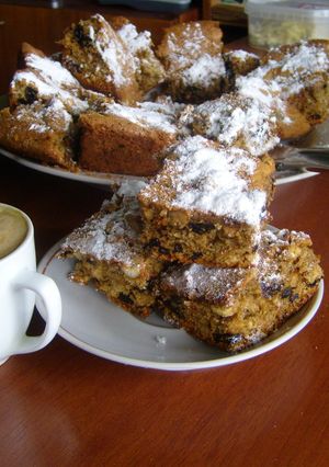 A picture of Cake with nuts and prunes.