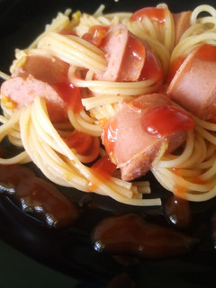 A picture of Beef smokie Spaghetti with sauce.