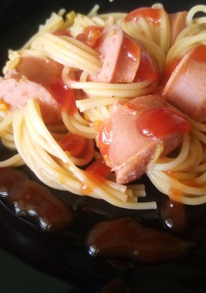 A picture of Beef smokie Spaghetti with sauce.