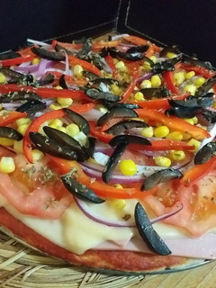 Una foto de Pizza con masa de avena