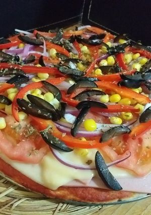 Una foto de Pizza con masa de avena