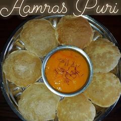 A picture of Aamras Puri.