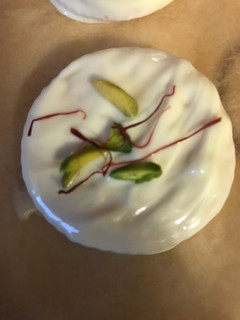 A picture of Chocolate covered Ritz crackers filled with white chocolate or peanut butter.