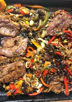 Una foto de Bifes a la criolla en Plancheta