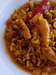 Una foto de Arroz meloso con bacalao y piquillos confitados