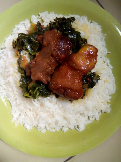 A picture of Wite Rice And vegetable soup.